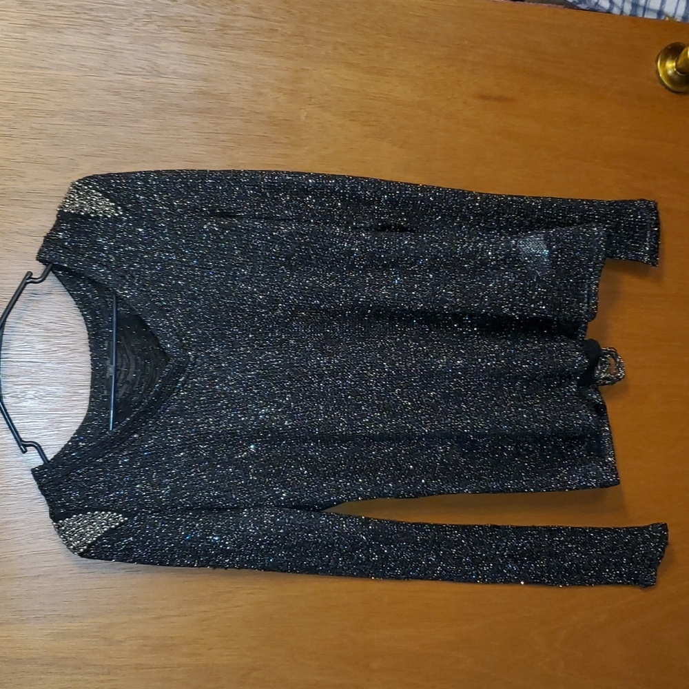 Miss Me Black Shimmering Top w/ embellished shoulders. Slit back.